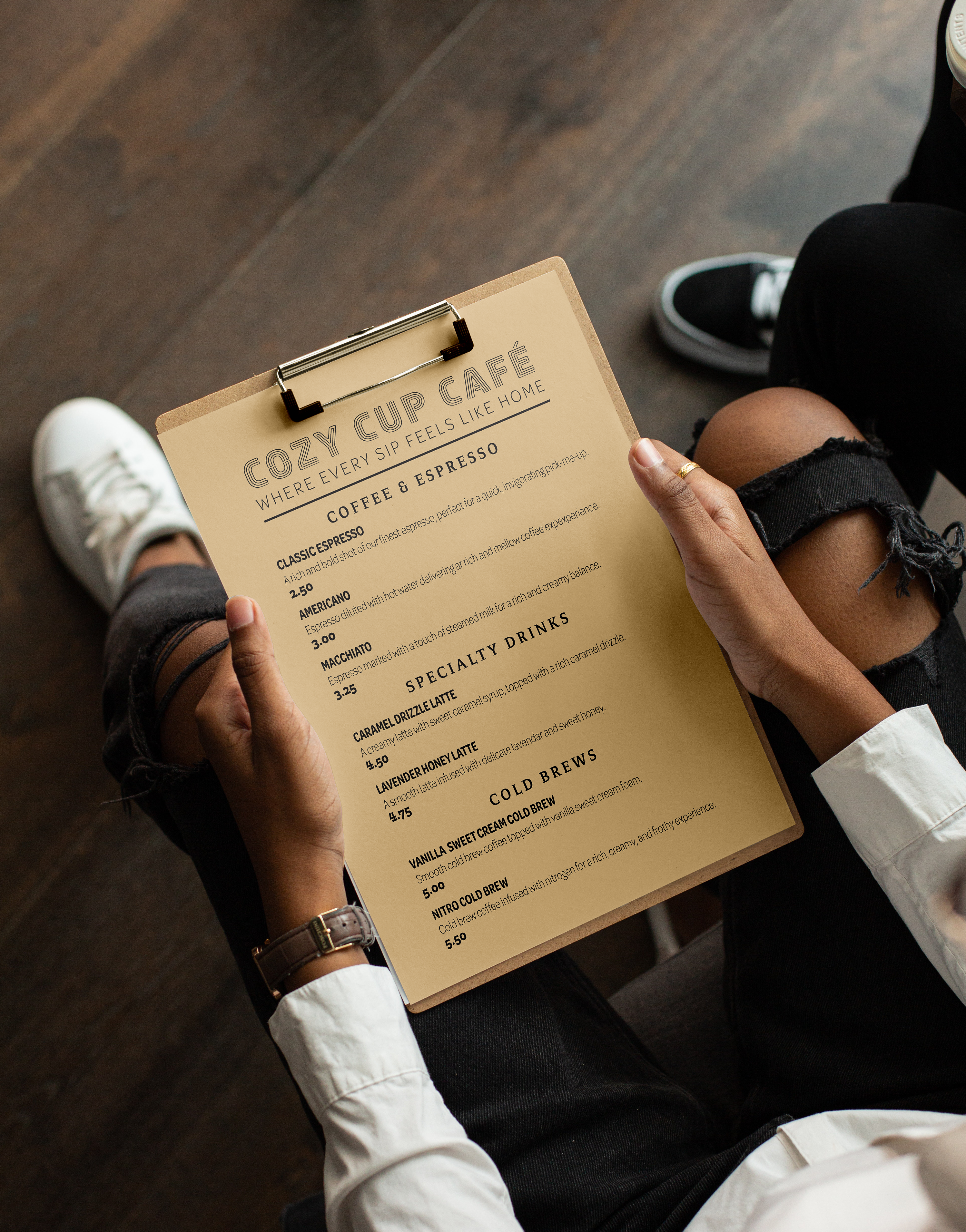 cafe menu in hands with coffee drink list